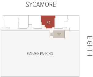 A red unit labeled B4 is highlighted at the building's north edge above a large Garage Parking area, beside an Elevator Lobby and facing Eighth Street on Sycamore.