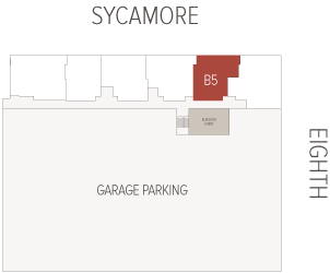A red-highlighted unit labeled B5 sits along the building’s northern row, adjacent to a gray elevator lobby and above a large GARAGE PARKING area; EIGHTH runs along the right.