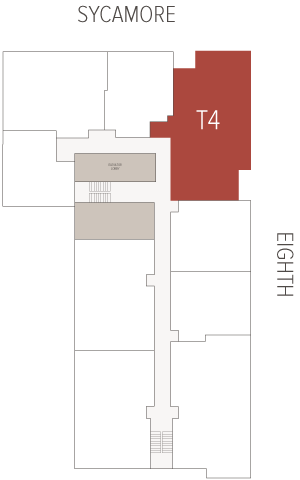 A red-shaded room labeled T4 occupies the building's east wing, attached to a central corridor with staircases and beige lobby blocks.